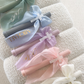 Ribbed Candles with Chiffon Bow and Marble Cross