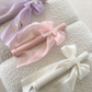 Ribbed Candles with Chiffon Bow and Marble Cross
