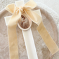 Ivory Velvet Bow Cross Candles