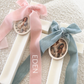 Ivory Velvet Bow Cross Candles